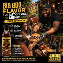 Person serving a burger at an Island Grill food truck with Legend Cookhouse branding.